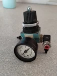 Wilkerson R00-C2-000 Pneumatic Air Regulator Valve With 0-6 Bar Guage 1/8" Npt. Fixed Price $68.00.