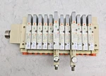Smc SS5V2-F2L01A Base Manifold With SV2200-5FU SV2100-5FU Solenoid Valves Used. Fixed Price $134.99.