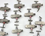 Rosemount 0306RT22BA11 C30610-1126-0000 Two Valve Pressure Manifold Piece. Fixed Price $99.00.
