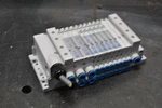 Festo Block W/ (8) Valves 568656, 556838, 533343. Fixed Price $300.00.