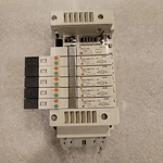 Smc Pneumatic Manifold Base VV5Q11-08-DAJJ00155, (5) VQ1301Y-5, VVQ1000-10A-1. Fixed Price $160.00.