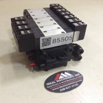 Koganei Manifold & Solenoid Valves A180-4E2-CPLL-12W Used #85505. Fixed Price $249.70.