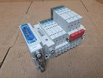 Smc Manifold Block SS5Y31-E4R012 W/ (9) Valves SY3201-5U1 SY30M-50-1A. Fixed Price $250.00.