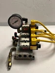 Numatics Manifold With (4) 031SA440E /1E 24 Volt Solenoids. Fixed Price $59.95.