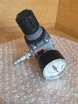 Wilkerson 927931 Common Port 1/4" Npt 0-125 Psig R09-02-FB00B Used. Fixed Price $15.00.