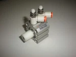 Smc NCQ8B075-037 Pneumatic Cylinder With Flow Controllers And Shaft. Fixed Price $19.99.
