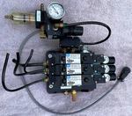 Three (3) Mac 92B-AAF-BJA-DM-DDAP-1DM3 Solenoid Valves Mounted On Manifold. Fixed Price $1295.00.