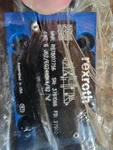 New In Plastic Rexroth R978017756 Directional Control Valve 4WE6J62/EG24N9K4/62. Fixed Price $139.99.