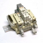 Smc SS5V1-DUQ01422 Pneumatic Manifold W/ (4) 10-SV1100R-5FU & (1) 10-SV1200R-5FU. Fixed Price $39.99.