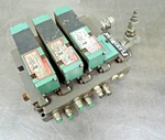 Numatics 24 Vdc Solenoid Valve With Flexiblok Three Bank 1/4" Npt Ports. Fixed Price $118.39.