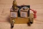 Solenoid Solutions Brass Valve Block 216VDC 14W 1/8 7/32 Orif 40PSI. Fixed Price $126.00.