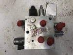 John Deere 320D Hydraulic Valve - Used P/n AT391652. Fixed Price $939.99.