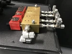 Parker Hydraulic Manifold 17006-40 With Solenoid Valves. Fixed Price $700.00.