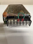 Cosel R100U-15 Enclosed Industrial Power Supply 15V 7A AC100-120V Silver. Fixed Price $60.00.