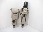 Smc AMG250-NO3C Water Separator Assembled With AW30-N03C-Z Pneumatic Regulator. Fixed Price $61.51.