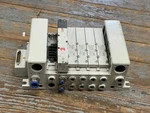 Smc HHB100006 Port Pneumatic Manifold With 4-VVQ4000 Solenoid Valves. Fixed Price $125.00.