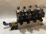 Lot Of 4 Parker FM3DDDKN 55 Hydraulic Flow Control Valve W/ Solenoids And Block. Fixed Price $550.00.