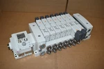 Smc Manifold Bank W/ (7) Solenoid Valves VSR8-4-FG-S-3VZR. Fixed Price $200.00.