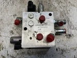 John Deere 320D Hydraulic Valve - Used P/n AT391652. Fixed Price $939.99.