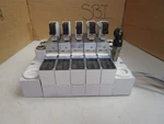 Koganei Solenoid Valve Bank PBM5P-9W W. (3) PB24C-38W & (2) PB24C-40W Vdc Use. Fixed Price $213.00.