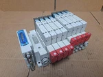 Smc Manifold Block SS5Y51-E4R113 W/ (8) Valves SY5201-5U1 SY50M-50-1A. Fixed Price $300.00.