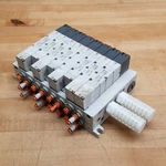 Smc VQ4301-5W, 8 Valve Pneumatic Assembly With Silencers Used. Fixed Price $88.44.